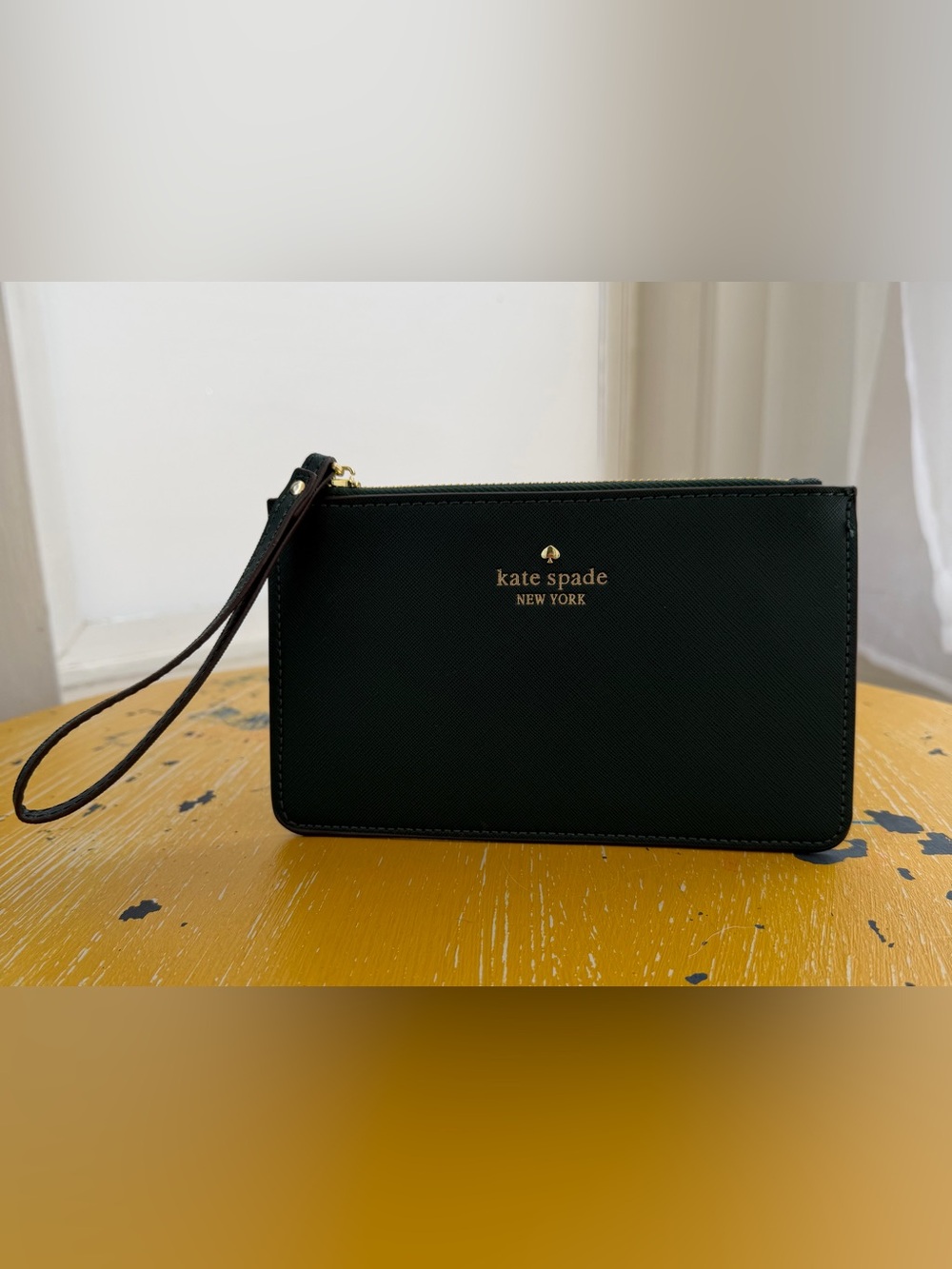 kate spade green and gold wristlet clutch